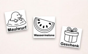 Schwarz-weiße Kritzelmotive für Kleinkinder: Maulwurf, Wassermelone und Geschenk mit Wortbeschriftung